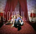 11-01-2003 Familie Paay Curry Patricia Paay, Adam Curry and Christina at home in Belgium. January 11, 2003.

[keywords]Bedroom, Laughing, On Bed[/keywords]